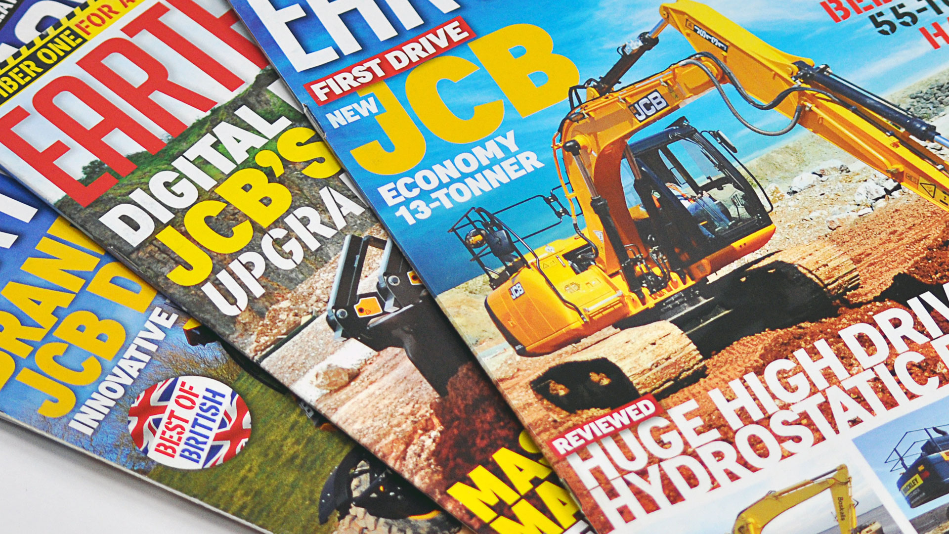 Earthmovers magazine covers featuring JCB